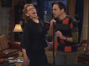 Leonard's mother singing with Sheldon.