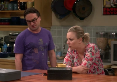 Watching Sheldon being interviewed.