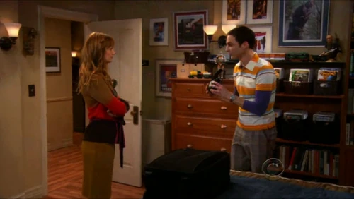 Showing Elizabeth his room.