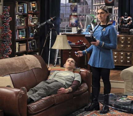 Sheldon gets Amy to wear a Star Trek medical uniform.