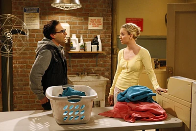 Discussing Penny's belief in psychics.