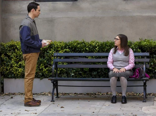 Sheldon brings apology hot dogs.