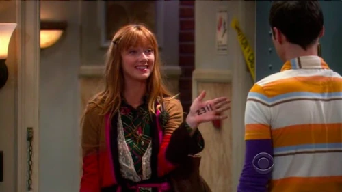 Elizabeth wrote down the street address on her hand.