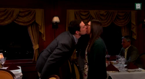 Sheldon leans into his first kiss of Amy.