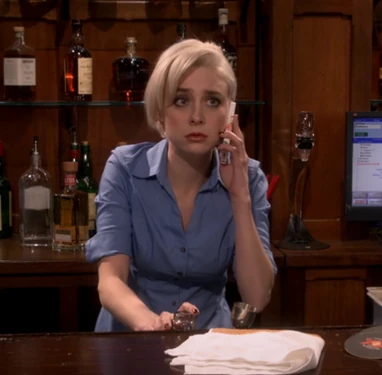 Talking to Raj about helping her.