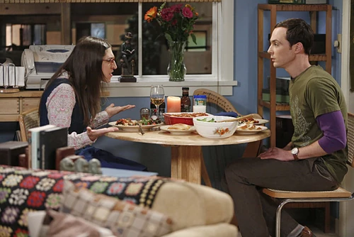 Amy listening to Sheldon's game system dilemma.