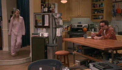 Penny wakes up, Leonard eats chicken fried steak.