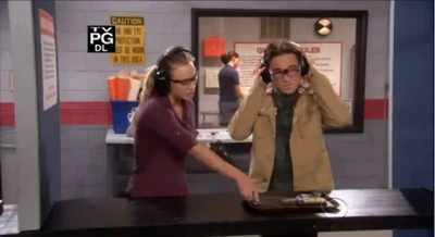 Leonard and Penny at the shooting range.