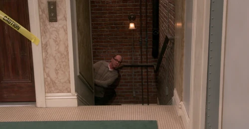 Larry sneaks back into the apartment.