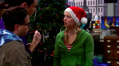 Trimming their Christmas tree.