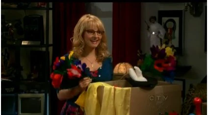 Bernadette holding some magic equipment.