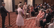 Mary applauding Penny.