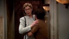 Leonard hugging his mother.