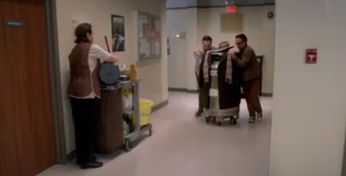 Running Uncle Harvey down the hallway.