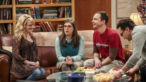 Sheldon doesn't want to touch the baby.