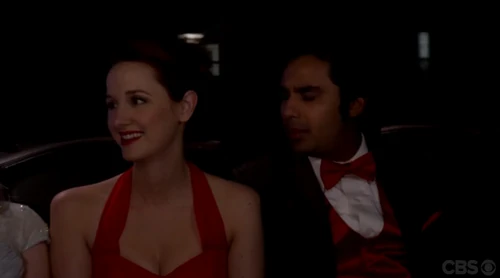 Emily and Raj on the way to the prom.