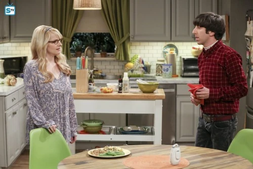 Why is Raj asleep on the couch?