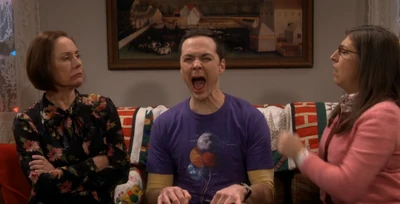 Removing the earring.