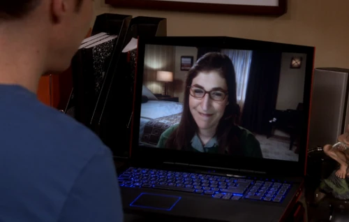 Amy happy to see Sheldon.