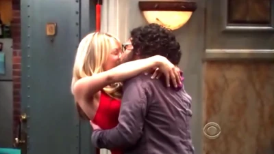 Penny attacking Leonard.