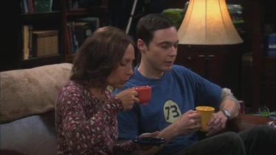 Mary and Sheldon drinking tea.
