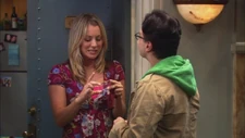 Leonard gifts Penny a snowflake.