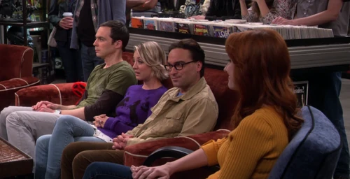 Emily and the trio watching Raj and Howard play their song.