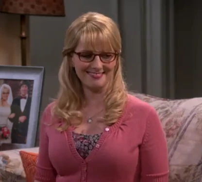 Bernadette laughing at Penny's comment.