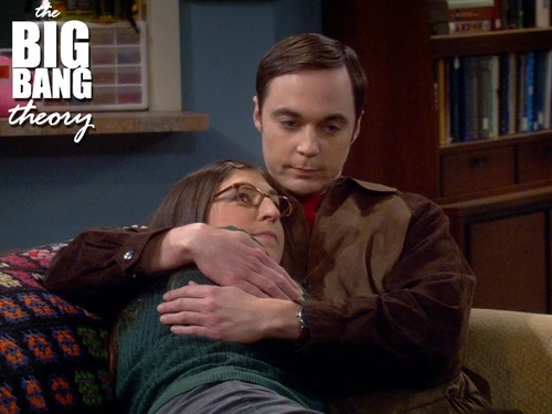Despite the awkwardness and the hesitance, Sheldon readily becomes Amy's "Cuddles".