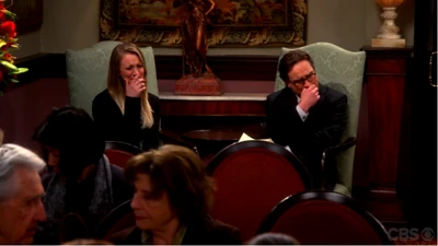 Both upset at Arthur Jeffries's (Professor Proton's) funeral.