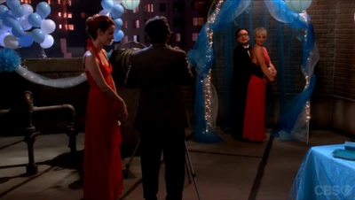 Having their prom picture taken.