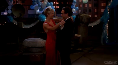 Leonard dancing with the prettiest girl at the prom.