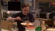 Sheldon eating spaghetti and meatballs at Amy's.