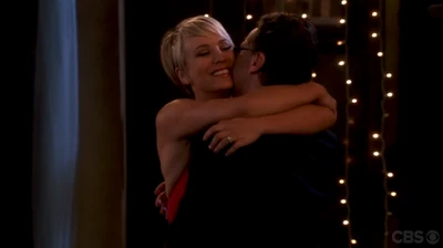 Leonard and Penny dancing at the prom.