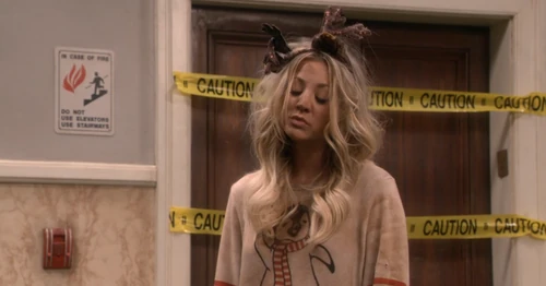 Looking at her trapped husband.