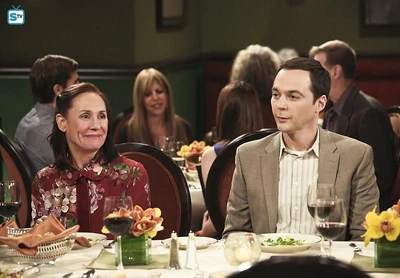 Mary is having a good time. Sheldon is oblivious.