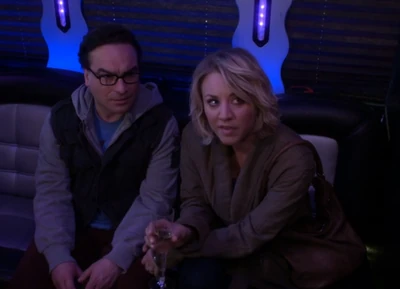 On the bus watching Sheldon apologize.
