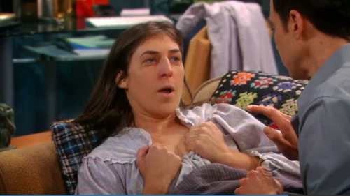 Amy getting ready for some treatment from Sheldon.