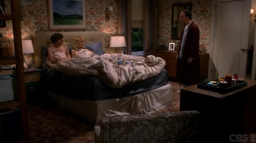 Stuart telling them that he's moving. They're naked.