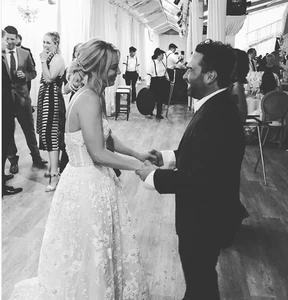 Fake husband; real wedding. At Kaley's wedding.