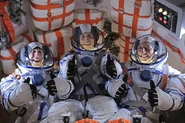 Expedition 31 crew in Soyuz capsule.