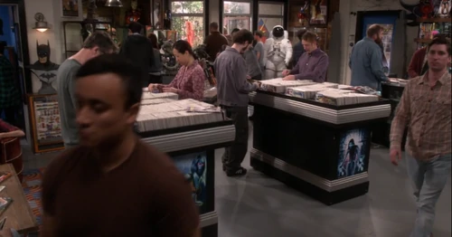 Lots of people at eh comic book store.