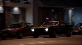 Georgie's 1973 Ford Mustang at night