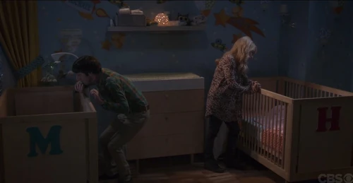 Admiring how cute their kids are.