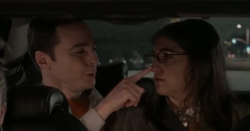 Sheldon touches Amy's nose with a "Boop!"