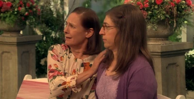 Mary comforting Amy.