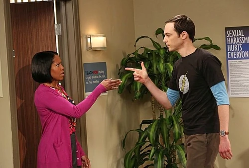 Giving a "weird"-ed Mrs. Davis a hip handshake.