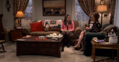 Waiting while Sheldon sulks in his room.