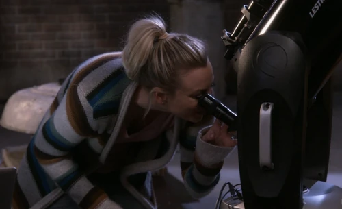 Penny trying out the telescope.