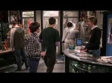 Sheldon escaping the comic book store's change.